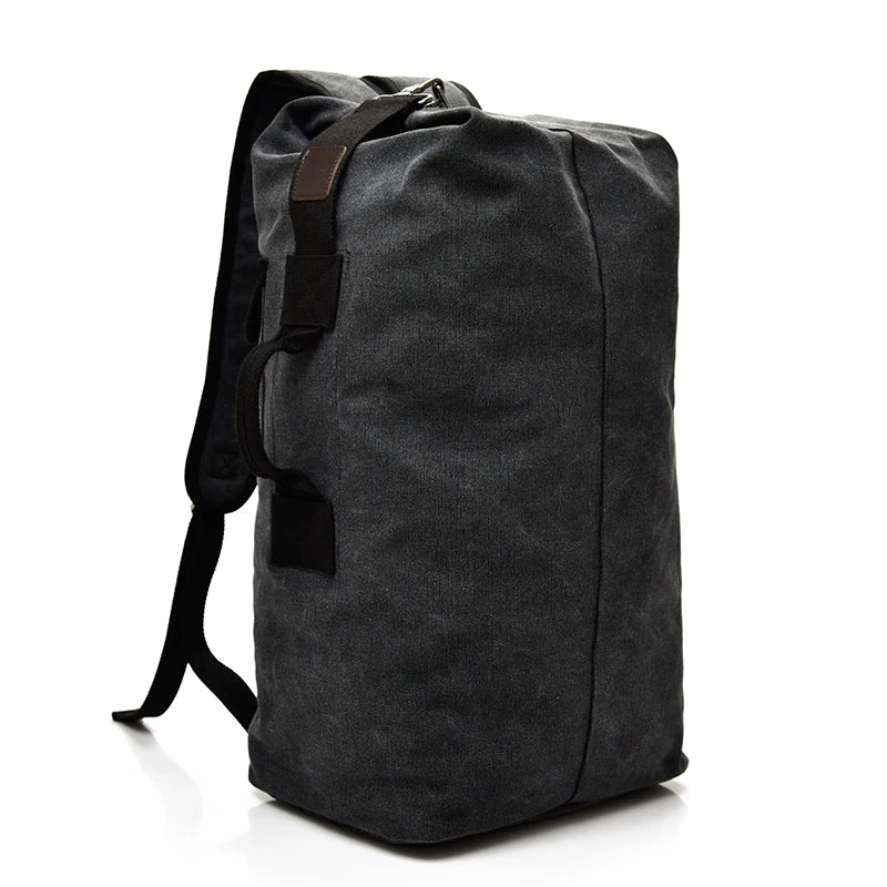 Dark grey canvas backpack with black straps, minimalist style, Orin & Vale bag