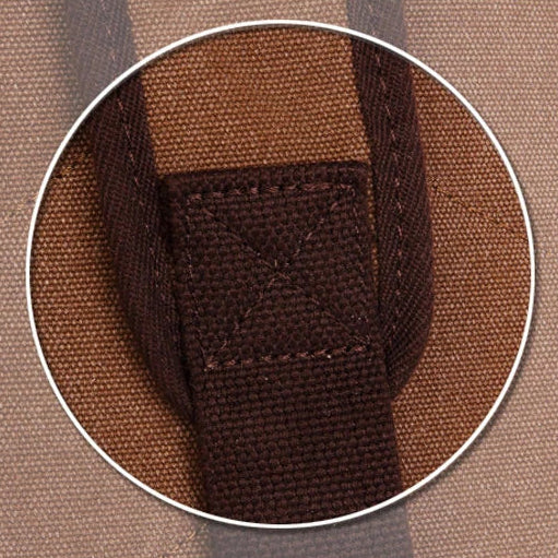 Close-up of durable brown canvas tote bag strap stitching from Orin & Vale
