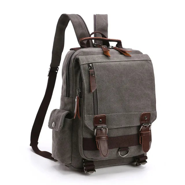 Orin & Vale gray canvas backpack with leather straps and multiple pockets on white background