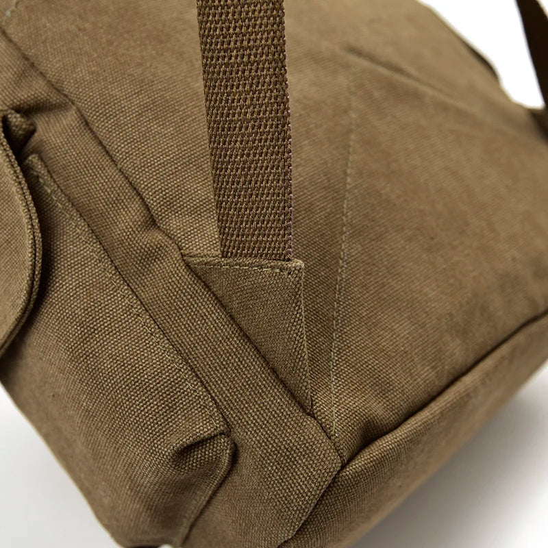 Close-up of Orin & Vale brown canvas bag with sturdy strap and side pocket detail
