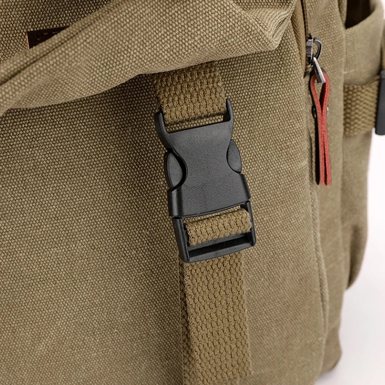 Close-up of Orin & Vale canvas backpack buckle and zipper with leather pull tab