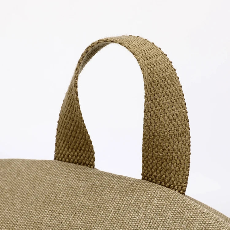 Close-up of tan canvas bag handle, Orin & Vale minimalist style
