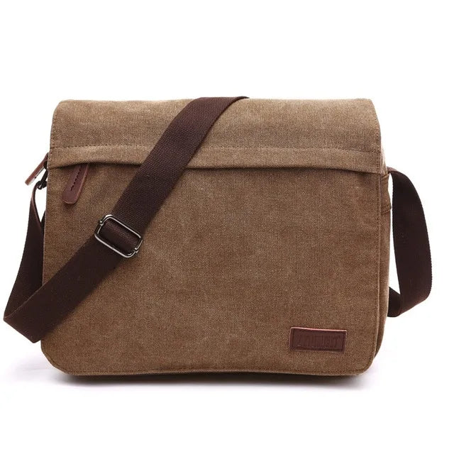 Brown canvas messenger bag with adjustable dark strap, Orin & Vale accessory