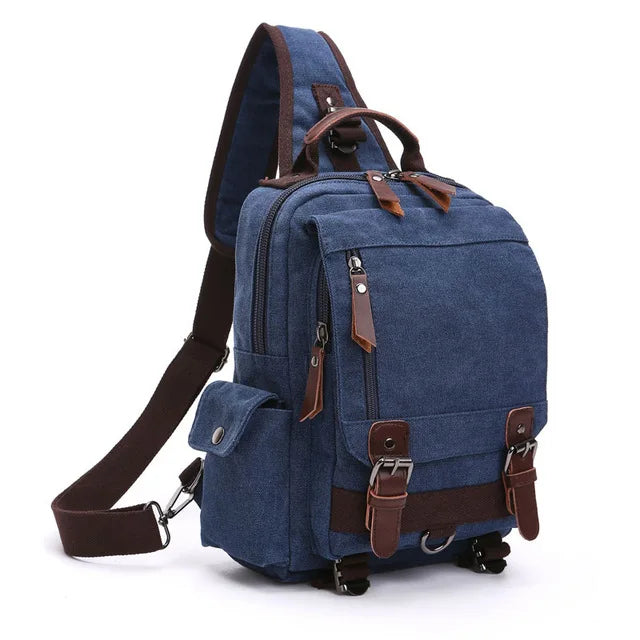 Blue canvas sling backpack with brown leather accents, Orin & Vale crossbody bag