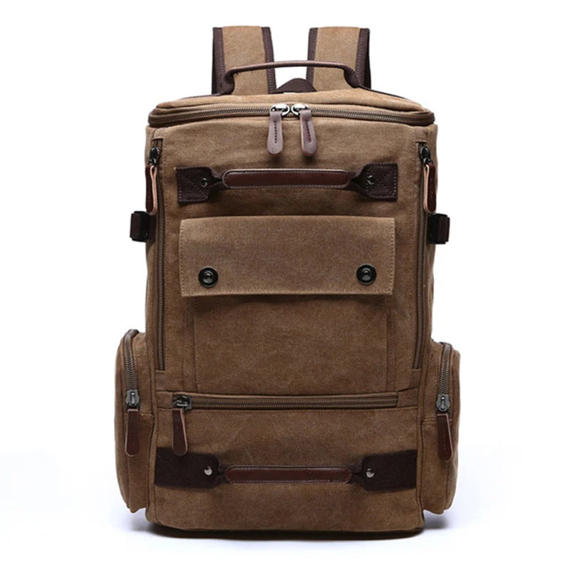 Orin & Vale brown canvas backpack with multiple pockets and leather accents, front view.