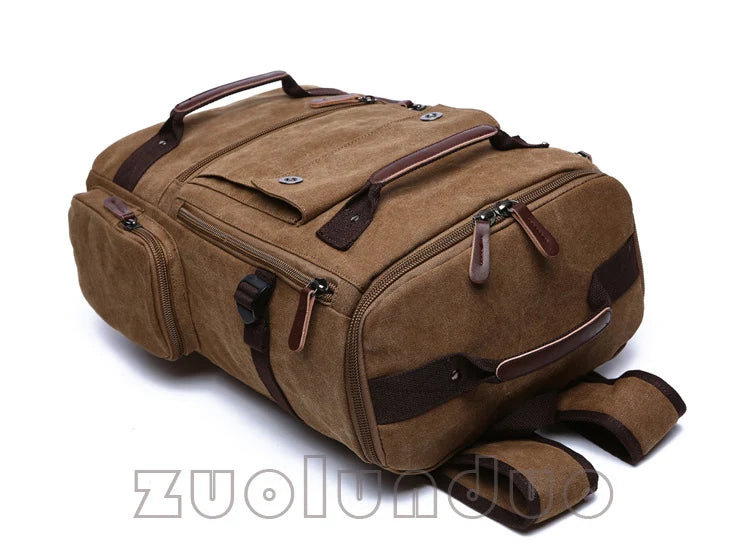Brown canvas travel duffel backpack with leather straps and multiple zippered pockets, Orin & Vale