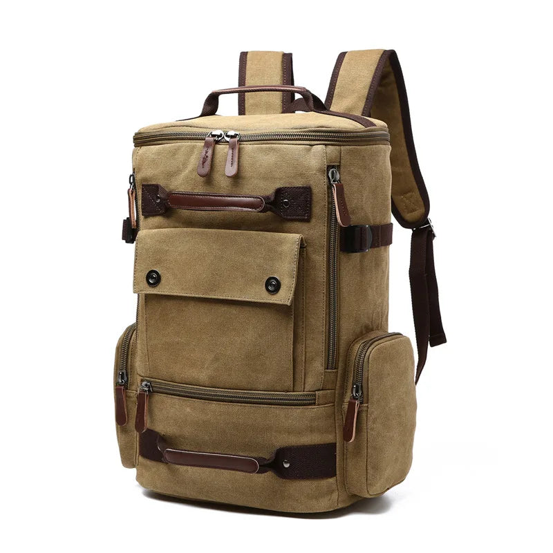 Canvas travel backpack with multiple pockets and brown leather accents from Orin & Vale