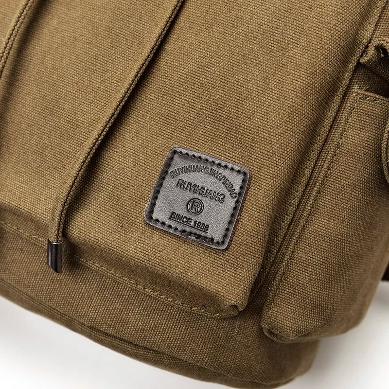 Close-up of durable olive green canvas bag with RUIYIHUANG branded leather patch, Orin & Vale