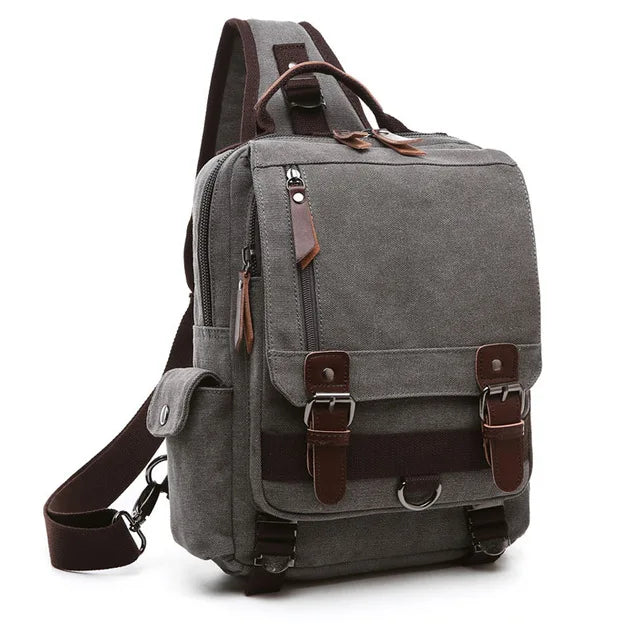 Orin & Vale gray canvas sling backpack with brown leather straps and multiple pockets