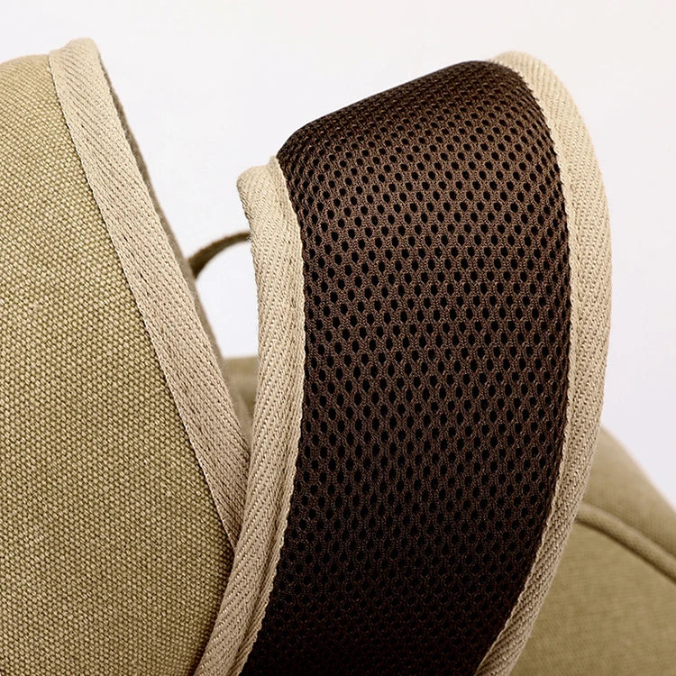 Close-up of Orin & Vale khaki canvas backpack with padded mesh shoulder strap