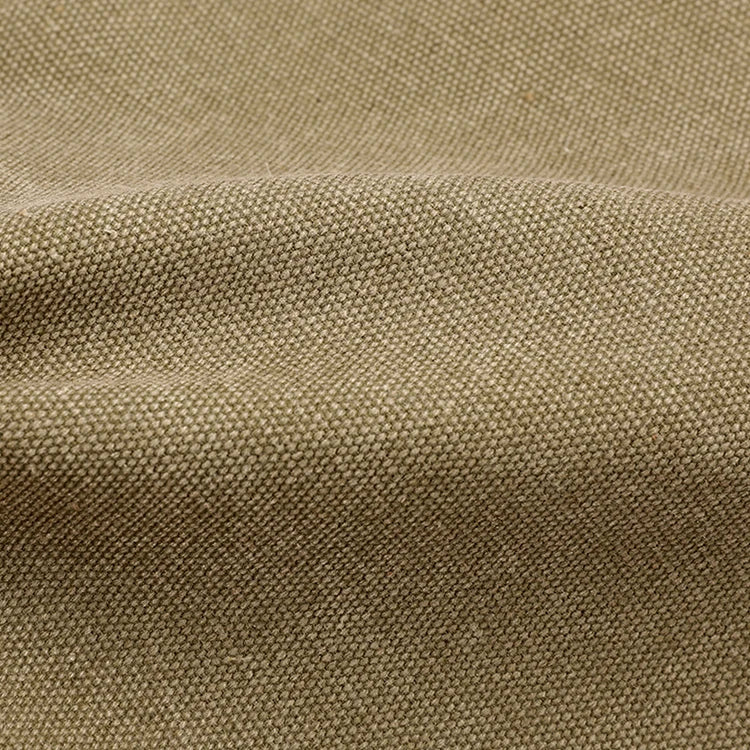 Close-up of textured beige woven fabric for Orin & Vale home decor products