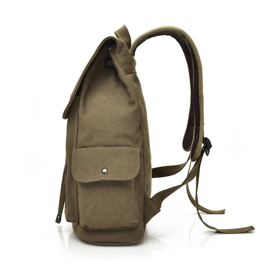 Side view of a brown canvas backpack with front pocket, Orin & Vale style